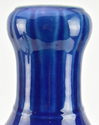 Lot 154 - QING / REPUBLIC MONCHROME BLUE GLAZED CERAMIC VASE 清 民国 刻龙纹蒜头瓶