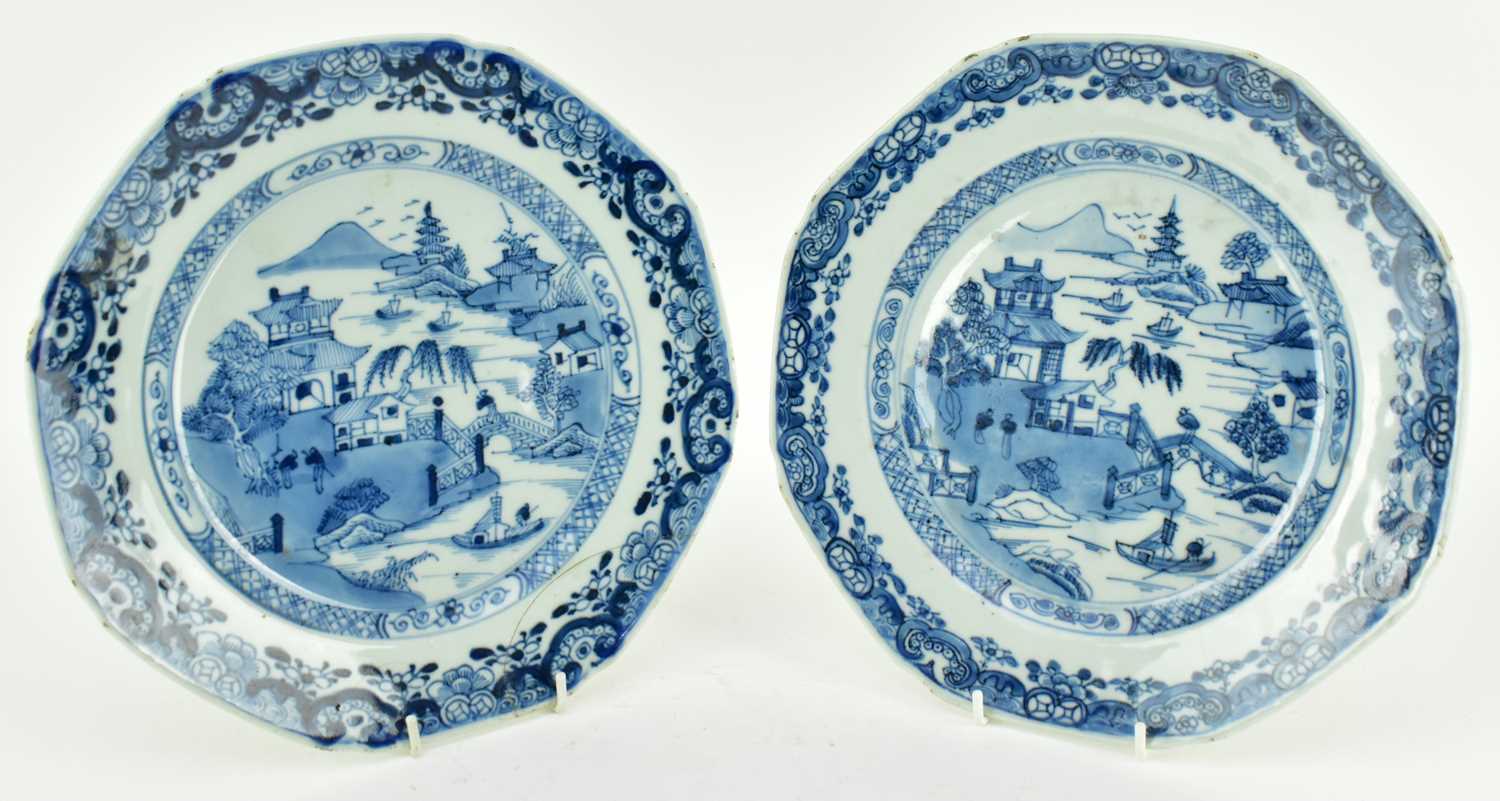 Lot 117 - PAIR OF QING DYNASTY BLUE AND WHITE CHARGERS 清 青花山水八角盘一对