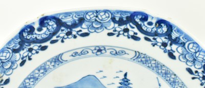 Lot 117 - PAIR OF QING DYNASTY BLUE AND WHITE CHARGERS 清 青花山水八角盘一对