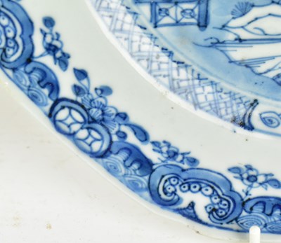 Lot 117 - PAIR OF QING DYNASTY BLUE AND WHITE CHARGERS 清 青花山水八角盘一对