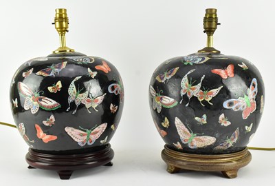 Lot 38 - PAIR OF QING DYNASTY FAMILLE NOIR CERAMIC LAMP BASE 清 黑底珐琅彩灯座一对