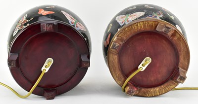Lot 38 - PAIR OF QING DYNASTY FAMILLE NOIR CERAMIC LAMP BASE 清 黑底珐琅彩灯座一对