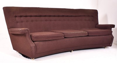 Lot 311 - MID CENTURY CURVED BUTTON BACK THREE SEATER SOFA