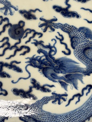 Lot 10 - LARGE QING DYNASTY GUANGXU BLUE AND WHITE 'DRAGON' CHARGER 清 光绪青花龙纹大盘
