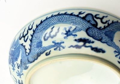Lot 10 - LARGE QING DYNASTY GUANGXU BLUE AND WHITE 'DRAGON' CHARGER 清 光绪青花龙纹大盘