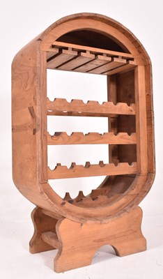 Lot 219 - 20TH CENTURY DOMED PINE WINE RACK