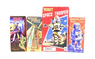 Lot 492 - TINPLATE TOYS - X4 VINTAGE KEY WOUND SPACE ROBOTS