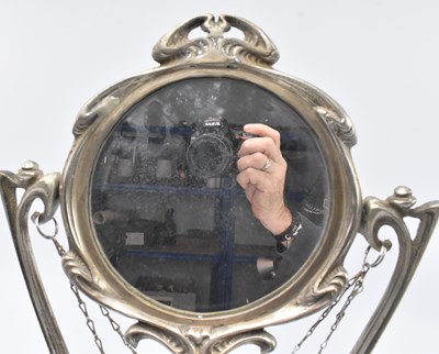 Lot 56 - ART NOUVEAU EARLY 20TH CENTURY SILVERED METAL SWING MIRROR, STAMPED ERTE