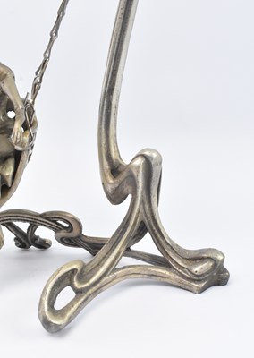 Lot 56 - ART NOUVEAU EARLY 20TH CENTURY SILVERED METAL SWING MIRROR, STAMPED ERTE