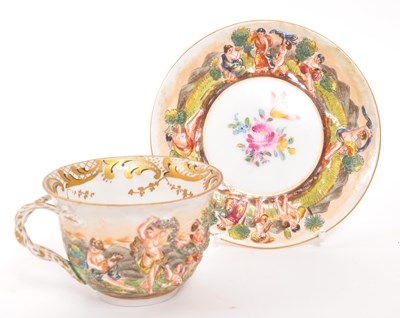 Lot 116 - CAPODIMONTE - 19TH CENTURY TEACUP & SAUCER GARDEN OF EDEN