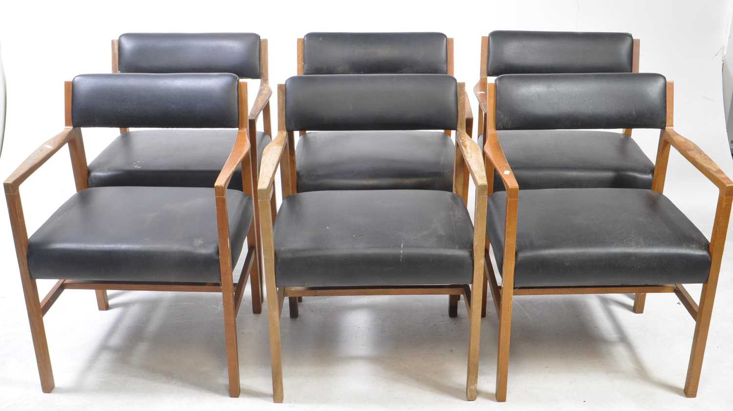 Lot 821 - MANNER OF ALFRED COX - SIX MID CENTURY 1970S TEAK & LEATHER CHAIRS