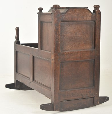 Lot 451 - 17TH CENTURY ENGLISH COUNTRY OAK CARVED OAK CRIB BED