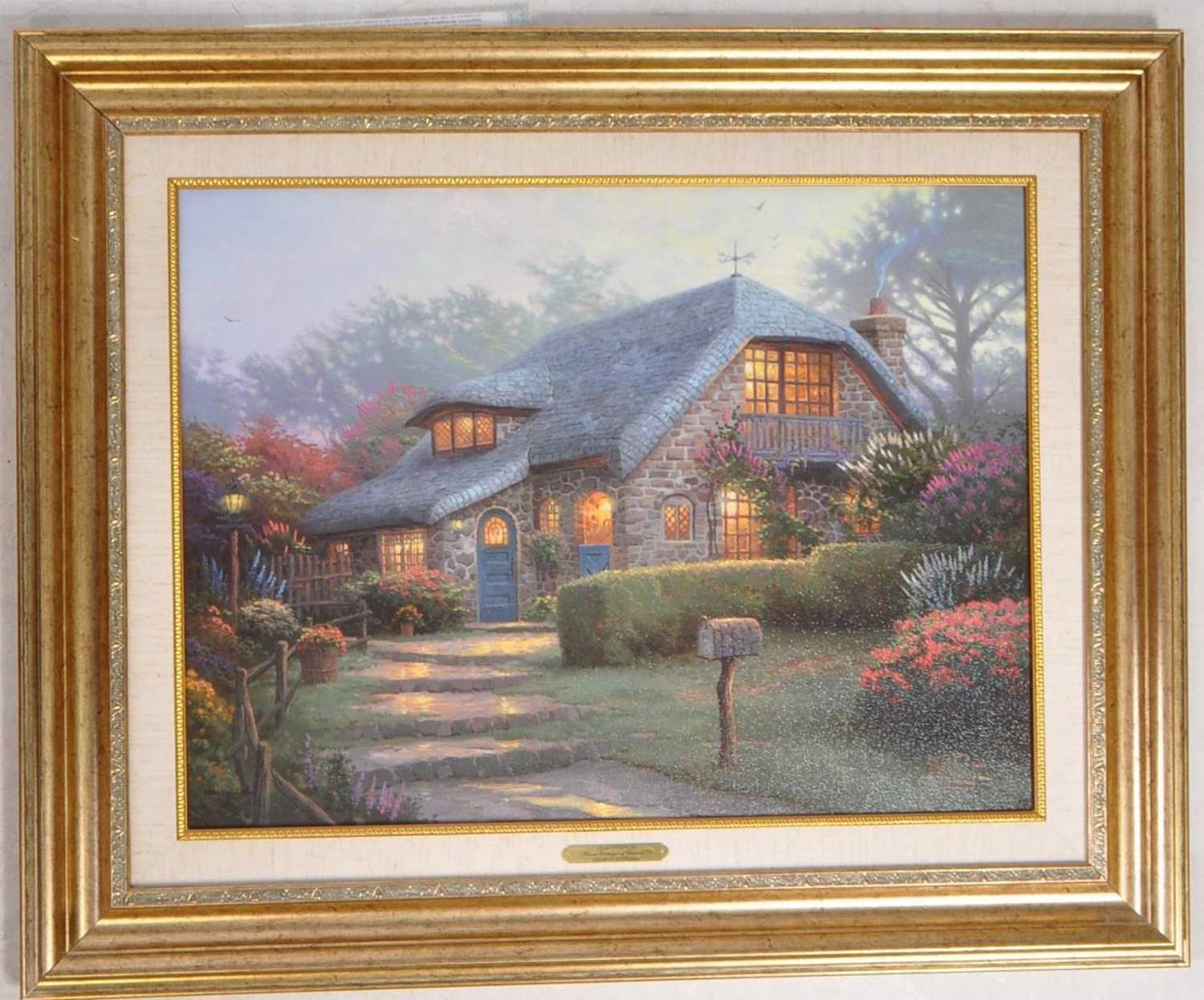 Lot 858 - THOMAS KINKADE (1958 - 2012) - 2002 LIMITED EDITION LILAC COTTAGE PRINT