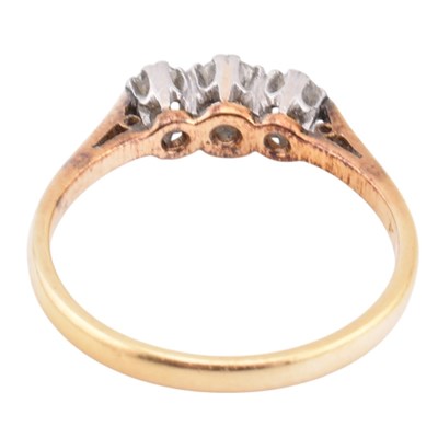 Lot 357 - 18CT GOLD & PLATINUM DIAMOND TRILOGY RING