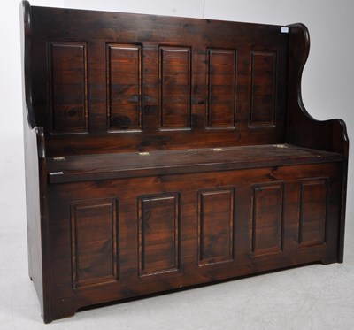 Lot 761 - 20TH CENTURY STAINED PINE MONKS HALL SETTLE BENCH