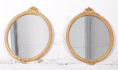 Lot 754 - TWO 19TH CENTURY FLORENTINE STYLE GILT OVAL MIRRORS