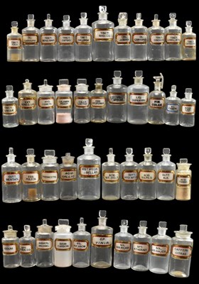 Lot 108 - CIRCA 40 EARLY 20TH CENTURY GLASS APOTHECARY / CHEMIST BOTTLES