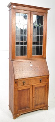 Lot 759 - EARLY 20TH CENTURY OAK ARTS AND CRAFTS BUREAU BOOKCASE
