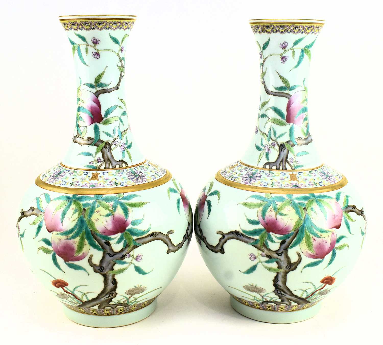 Lot 12 - PAIR OF LARGE “NINE PEACHES” TIANQIUPING VASES 宣统款 粉彩九桃图大天球瓶