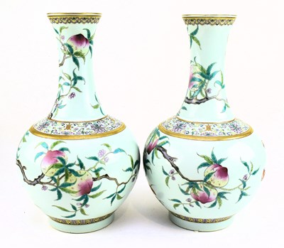 Lot 12 - PAIR OF LARGE “NINE PEACHES” TIANQIUPING VASES 宣统款 粉彩九桃图大天球瓶
