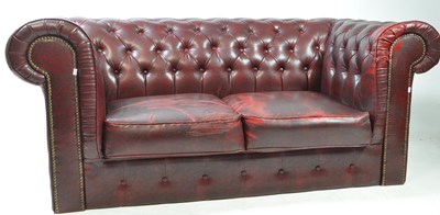 Lot 724 - TWO SEATER CHESTERFIELD OXBLOOD LEATHER SOFA SETTEE