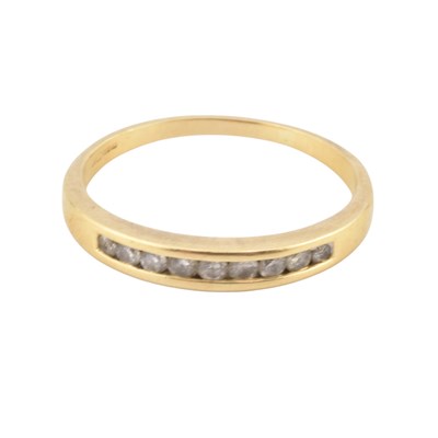 Lot 377 - 18CT GOLD & DIAMOND NINE STONE RING