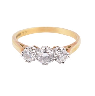 Lot 380 - 18CT GOLD & DIAMOND THREE STONE RING