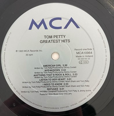 Lot 8 - TOM PETTY & THE HEARTBREAKERS - FOUR VINYL RECORDS