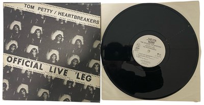 Lot 8 - TOM PETTY & THE HEARTBREAKERS - FOUR VINYL RECORDS