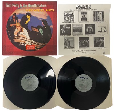 Lot 8 - TOM PETTY & THE HEARTBREAKERS - FOUR VINYL RECORDS