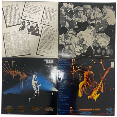 Lot 8 - TOM PETTY & THE HEARTBREAKERS - FOUR VINYL RECORDS