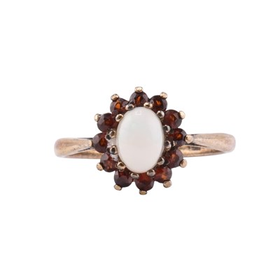 Lot 464 - SILVER OPAL & GARNET CLUSTER RING.