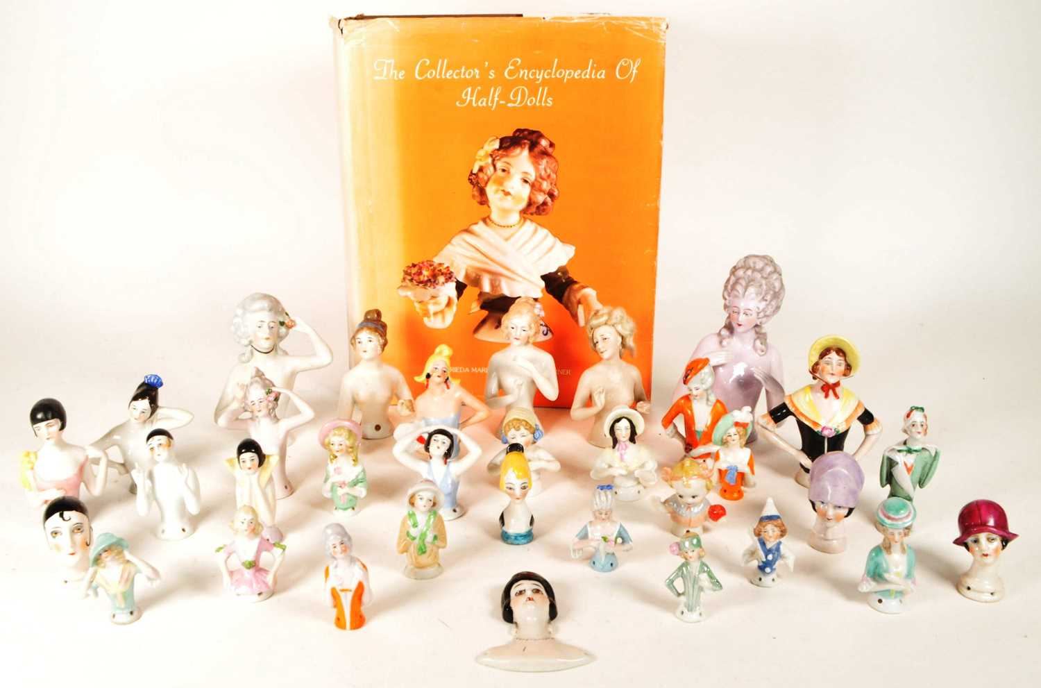 Lot 98 - COLLECTION OF 20TH CENTURY PORCELAIN PIN CUSHION HALF DOLLS AND BOOK