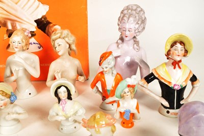 Lot 98 - COLLECTION OF 20TH CENTURY PORCELAIN PIN CUSHION HALF DOLLS AND BOOK