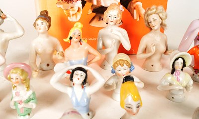 Lot 98 - COLLECTION OF 20TH CENTURY PORCELAIN PIN CUSHION HALF DOLLS AND BOOK