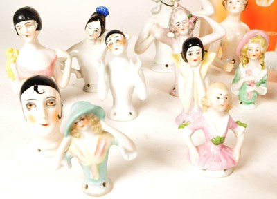 Lot 98 - COLLECTION OF 20TH CENTURY PORCELAIN PIN CUSHION HALF DOLLS AND BOOK