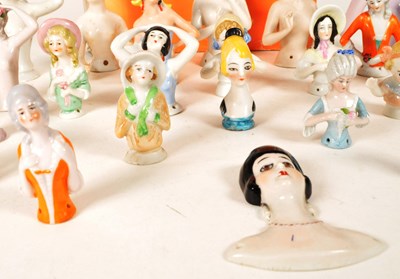 Lot 98 - COLLECTION OF 20TH CENTURY PORCELAIN PIN CUSHION HALF DOLLS AND BOOK