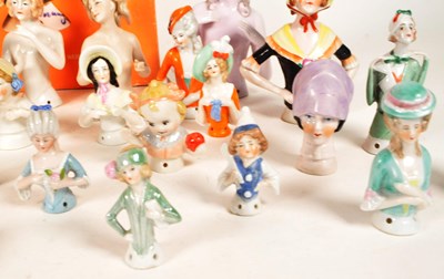 Lot 98 - COLLECTION OF 20TH CENTURY PORCELAIN PIN CUSHION HALF DOLLS AND BOOK