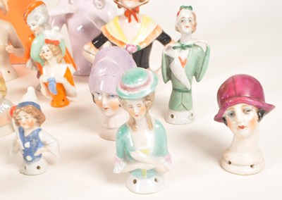Lot 98 - COLLECTION OF 20TH CENTURY PORCELAIN PIN CUSHION HALF DOLLS AND BOOK