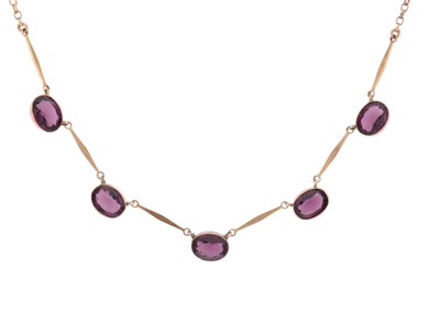 Lot 105 - 9CT GOLD & PURPLE PASTE RIVIERE NECKLACE