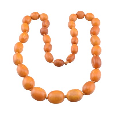 Lot 87 - EGG YOLK AMBER BEAD NECKLACE