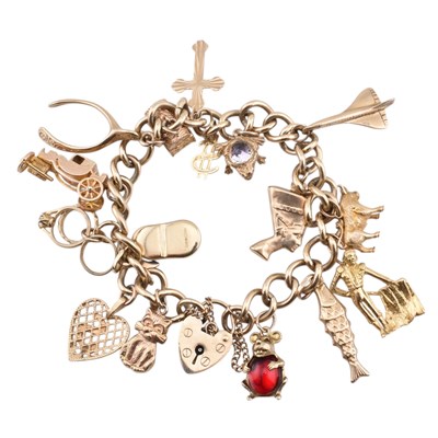 Lot 75 - HALLMARKED 9CT GOLD CHARM BRACELET