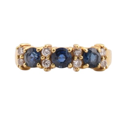 Lot 131 - 18CT GOLD SAPPHIRE & DIAMOND RING