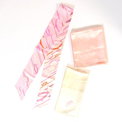 Lot 531 - THREE CARTIER SILK SCARVES