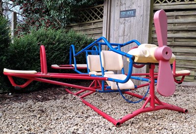 Lot 462 - VINTAGE TOY PLAYGROUND SEVEN PERSON AEROPLANE SEESAW RIDE, CHROME FRAME & PLASTIC FITTINGS