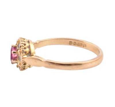 Lot 46 - HALLMARKED 9CT GOLD RUBY & DIAMOND HALO RING