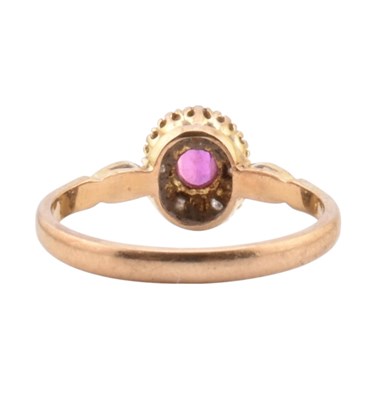 Lot 46 - HALLMARKED 9CT GOLD RUBY & DIAMOND HALO RING