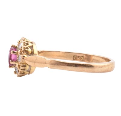 Lot 46 - HALLMARKED 9CT GOLD RUBY & DIAMOND HALO RING