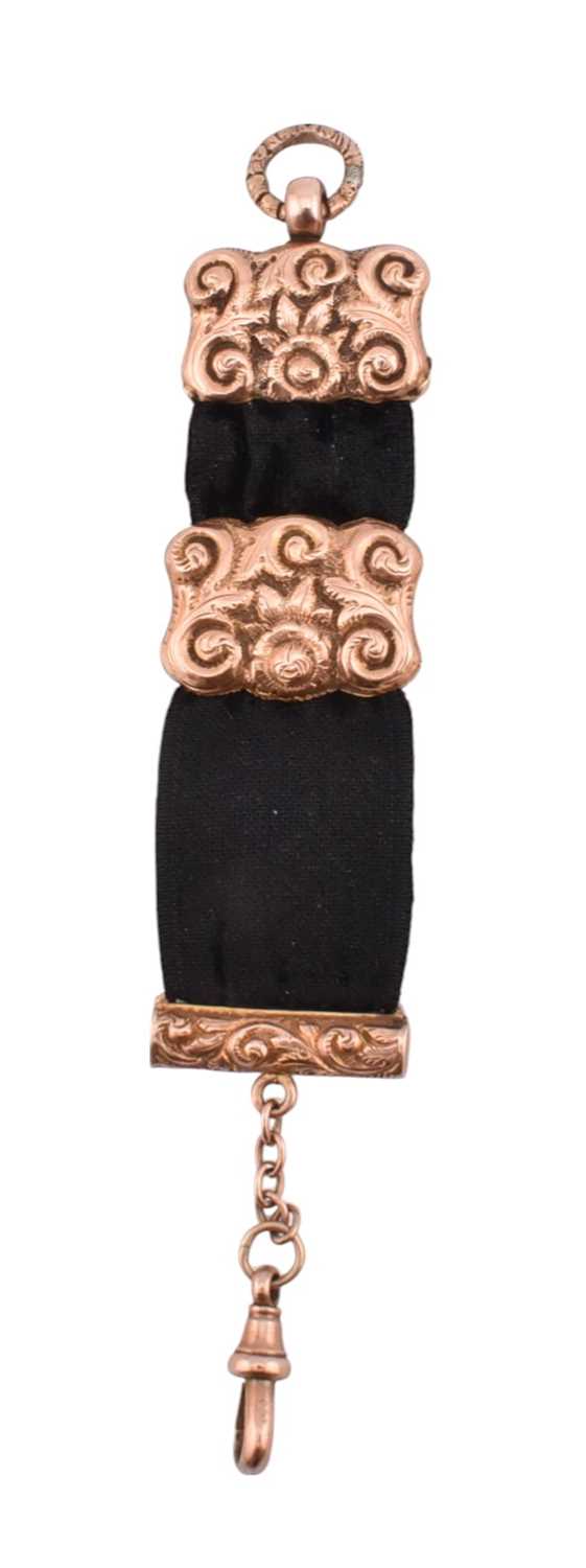 Lot 44 - 19TH CENTURY GOLD MOUNTED BLACK RIBBON WATCH FOB