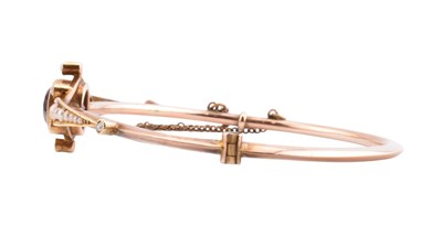Lot 3 - EDWARDIAN 9CT GOLD AMETHYST & PEARL HINGED BANGLE